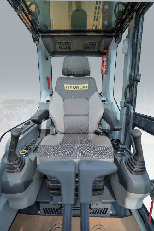 Wide-Body Cab Interior with Suspension Seat of the Hyundai HX135G Wide-Body Cab Interior with Suspension Seat of the Hyundai HX135G