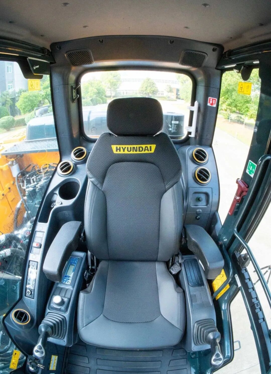 Cab Interior with Suspension Seat of the Hyundai HX130 Cab Interior with Suspension Seat of the Hyundai HX130
