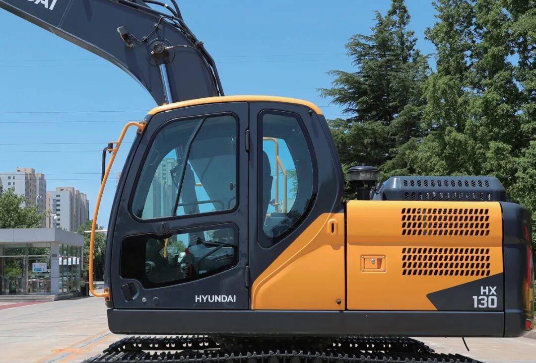Hyundai HX130 Excavator Side View on Site Hyundai HX130 Excavator Side View on Site