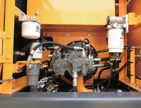Main Hydraulic Pump and Filter Compartment of the Hyundai HX135G Main Hydraulic Pump and Filter Compartment of the Hyundai HX135G